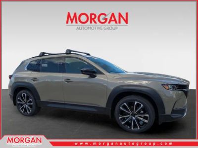 2026 Mazda CX-50 2.5 Turbo Premium Plus in Zircon Sand Metallic — front three-quarter view