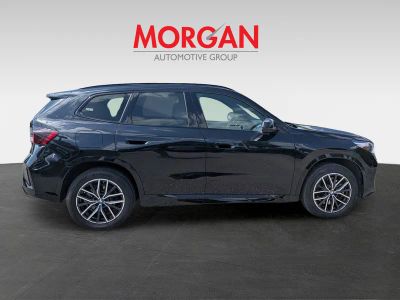 2026 BMW X1 — rear three-quarter view