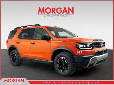 2026 Honda Passport TrailSport Elite in Sunset Orange — front three-quarter view