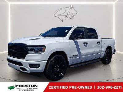 2023 RAM 1500 Laramie in Bright White Clearcoat — front three-quarter view