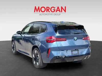 2026 BMW X3 — rear three-quarter view