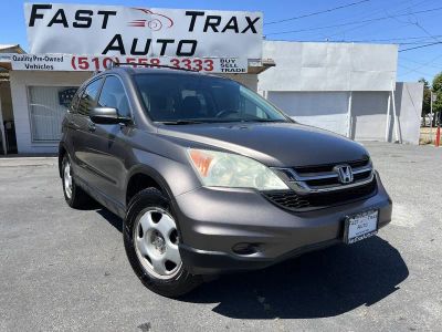 2010 Honda CR-V in Urban Titanium Metallic — front three-quarter view