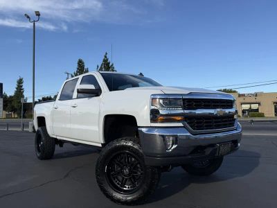 2018 Chevrolet Silverado 1500 in White — front three-quarter view