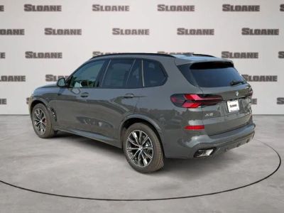 2026 BMW X5 — rear three-quarter view