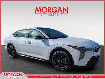 2025 Kia K4 GT-Line Turbo in Snow White Pearl — front three-quarter view