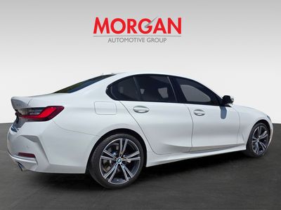 2023 BMW 3 Series — rear three-quarter view