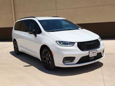2024 Chrysler Pacifica Touring L S package in Bright White Clearcoat — front three-quarter view