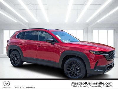 2026 Mazda CX-50 Hybrid Premium in Red — front three-quarter view