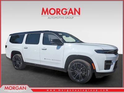 2026 Jeep Grand Wagoneer L Summit Obsidian in White/off-white — front three-quarter view