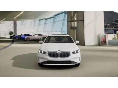2027 BMW 5 Series — rear three-quarter view