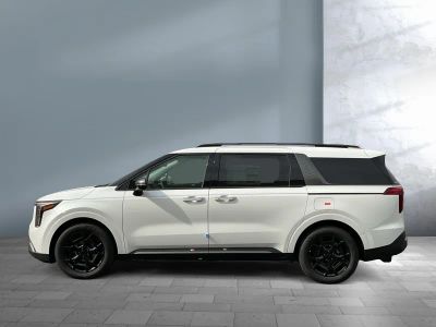 2026 Kia Carnival Hybrid — rear three-quarter view