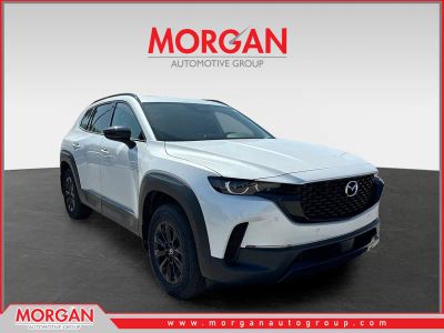 2026 Mazda CX-50 Hybrid Premium in Wind Chill Pearl — front three-quarter view