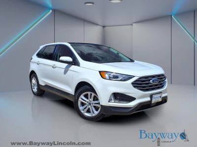 2020 Ford Edge SEL in White Metallic — front three-quarter view