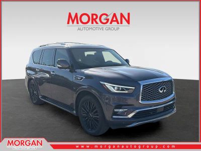 2019 INFINITI QX80 LIMITED in Anthracite Gray — front three-quarter view