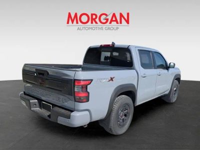 2026 Nissan Frontier — rear three-quarter view