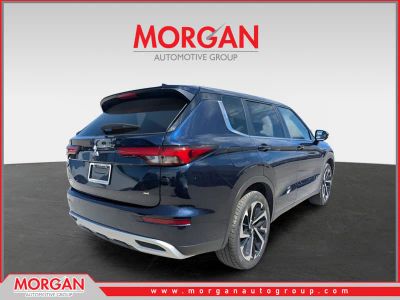 2024 Mitsubishi Outlander — rear three-quarter view