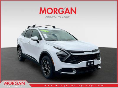 2024 Kia Sportage EX in Glacial White Pearl — front three-quarter view