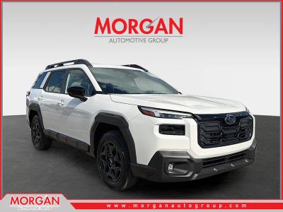 2026 Subaru Outback Limited in Crystal White Pearl — front three-quarter view