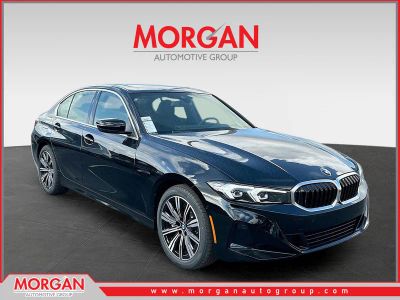 2026 BMW 3 Series 330i in Black — front three-quarter view