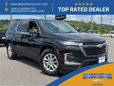 2023 Chevrolet Traverse LS in Mosaic Black Metallic — front three-quarter view