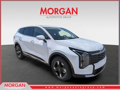 2026 Kia Sportage LX in Glacial White Pearl — front three-quarter view