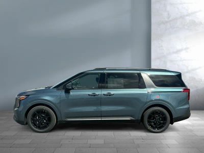 2026 Kia Carnival Hybrid — rear three-quarter view