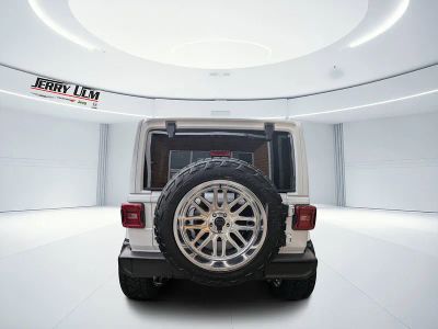 2025 Jeep Wrangler — rear three-quarter view