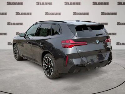 2026 BMW X3 — rear three-quarter view