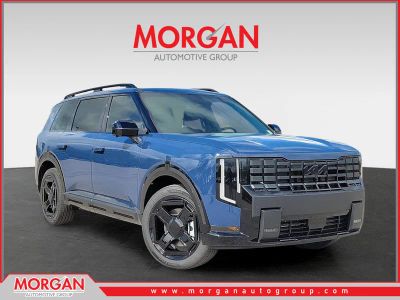 2027 Kia Telluride Hybrid X-Line SX in Midnight Lake Blue — front three-quarter view