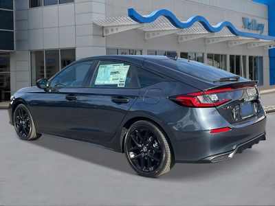 2026 Honda Civic Hatchback Hybrid — rear three-quarter view