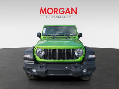 2025 Jeep Wrangler — rear three-quarter view