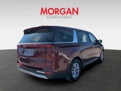 2024 Kia Carnival — rear three-quarter view