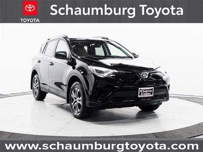 2018 Toyota RAV4 LE in Black — front three-quarter view
