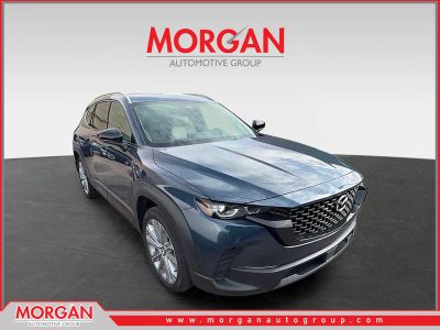 2026 Mazda CX-50 2.5 S Premium in Ingot Blue Metallic — front three-quarter view