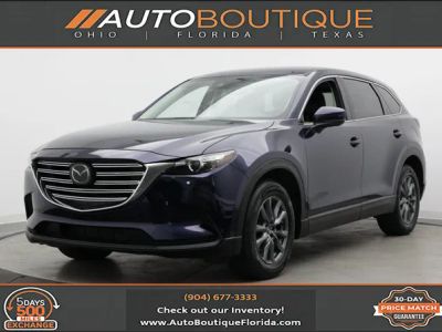 2022 Mazda CX-9 Touring in Deep Crystal Blue Mica — front three-quarter view
