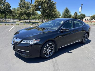2015 Acura TLX in Black — front three-quarter view