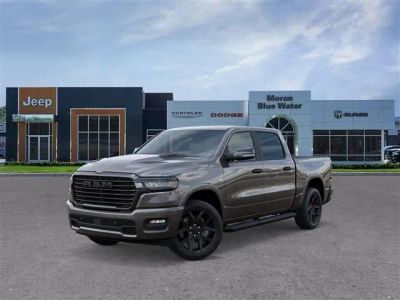 2026 RAM Ram 1500 RAM 1500 LARAMIE CREW CAB 4X4 5'7' BOX in Granite Crystal Metallic Clear-Coat Exterior Paint — front three-quarter view