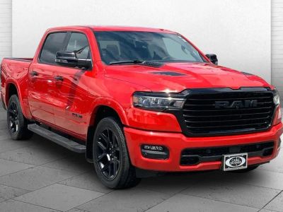 2025 RAM 1500 Laramie in Flame Red Clearco — front three-quarter view