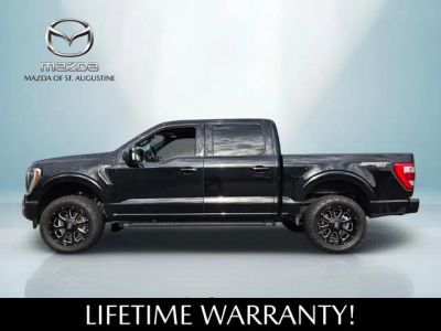 2023 Ford F-150 — rear three-quarter view