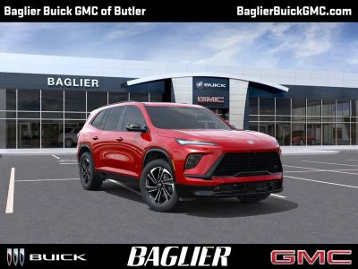 2026 Buick Enclave Sport Touring in Cherry Red Tintcoat — front three-quarter view