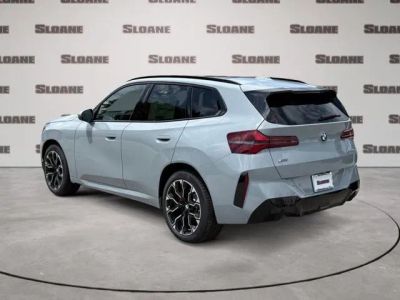 2026 BMW X3 — rear three-quarter view