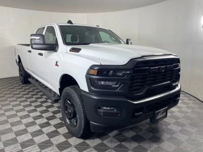 2026 RAM 2500 RAM 2500 TRADESMAN CREW CAB 4X4 8' BOX in Bright White Clear-Coat Exterior Paint — front three-quarter view
