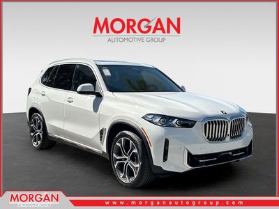 2026 BMW X5 sDrive40i in Alpine White — front three-quarter view