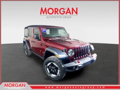 2021 Jeep Wrangler Unlimited Rubicon in Red — front three-quarter view