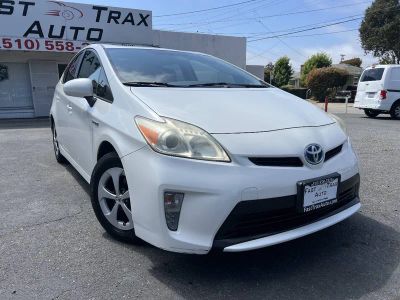 2013 Toyota Prius in Blizzard Pearl — front three-quarter view