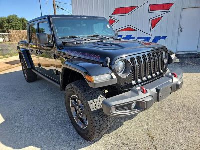 2023 Jeep Gladiator Rubicon in Black Clearcoat — front three-quarter view