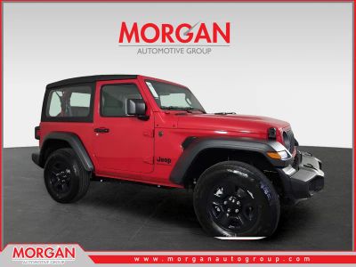 2026 Jeep Wrangler Sport in Red — front three-quarter view