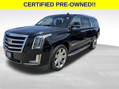 2018 Cadillac Escalade ESV Luxury in Black Raven — front three-quarter view