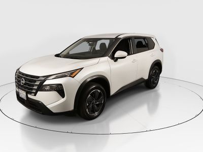 2025 Nissan Rogue — rear three-quarter view