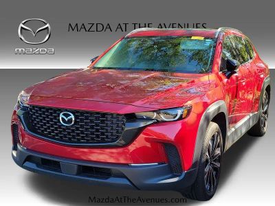 2025 Mazda CX-50 2.5 S Premium Plus Package in Red — front three-quarter view